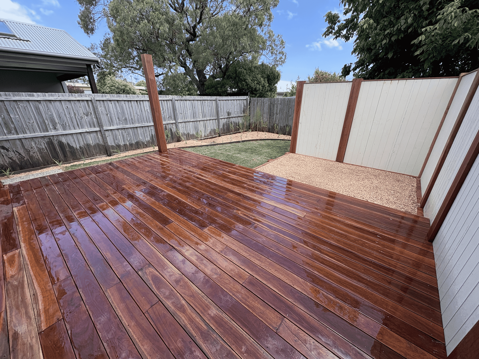 timber decking and privacy screen build in backyard in Melbourne by bullscapes